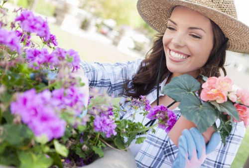 Landscaper preparing plants and soil for a garden project
